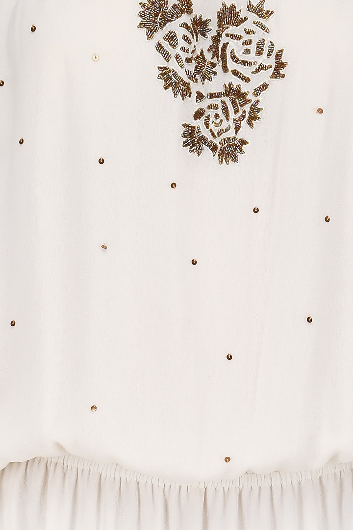 White motive embroidered Off shoulder dress available only at Pernia's Pop Up Shop.