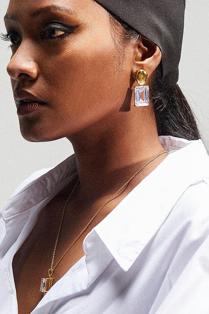 Gold Plated Cubic Zirconia Dangler Earrings In Sterling Silver by Apara Disum at Pernia's Pop Up Shop