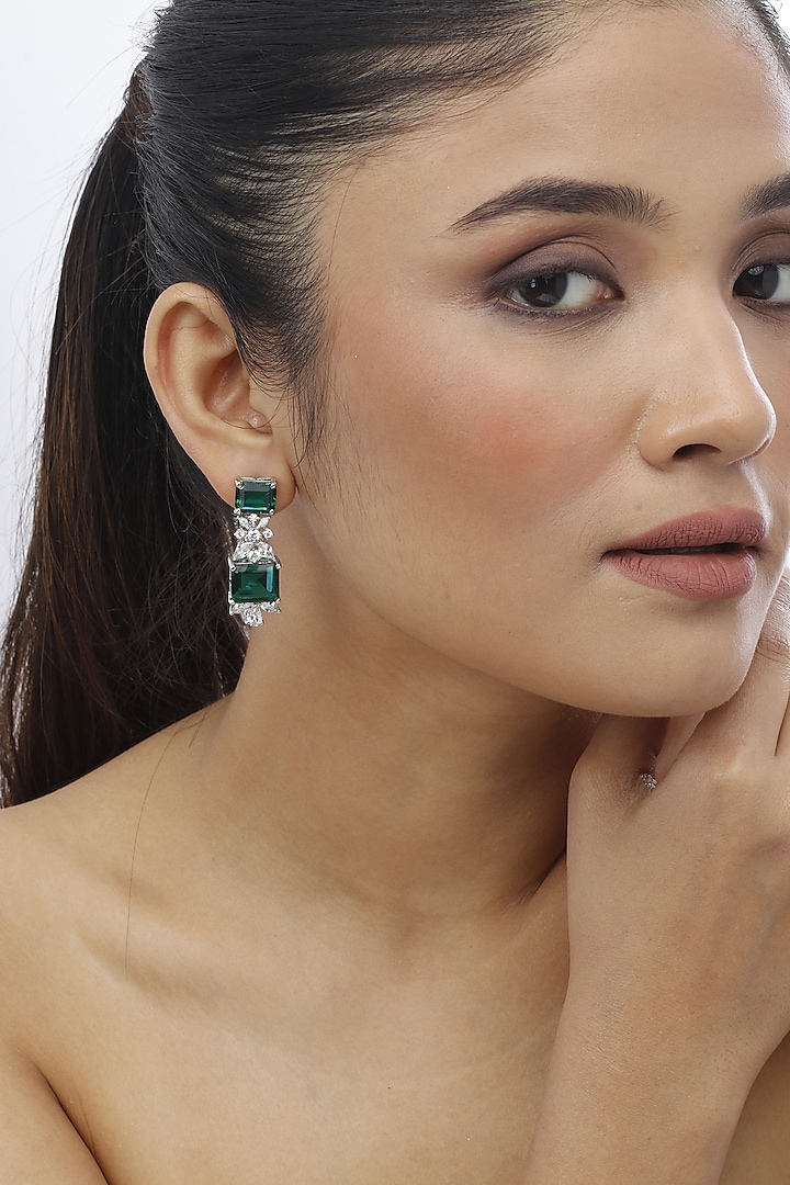 White Finish Emerald-Cut Green Swarovski Dangler Earrings In Sterling Silver by Tesoro by Bhavika