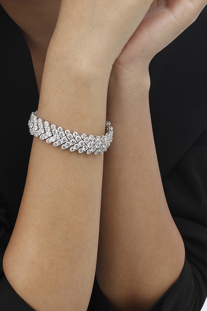 White Finish Swarovski Bracelet In Sterling Silver by Tesoro by Bhavika at Pernia's Pop Up Shop