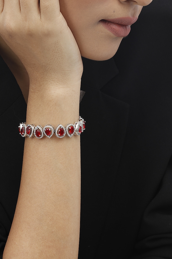 White Finish Swarovski & Ruby Bracelet In Sterling Silver by Tesoro by Bhavika at Pernia's Pop Up Shop