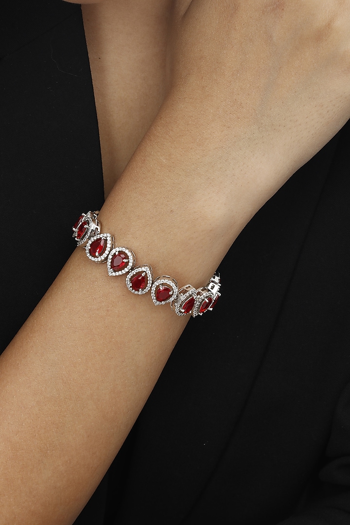 White Finish Swarovski & Ruby Bracelet In Sterling Silver by Tesoro by Bhavika at Pernia's Pop Up Shop