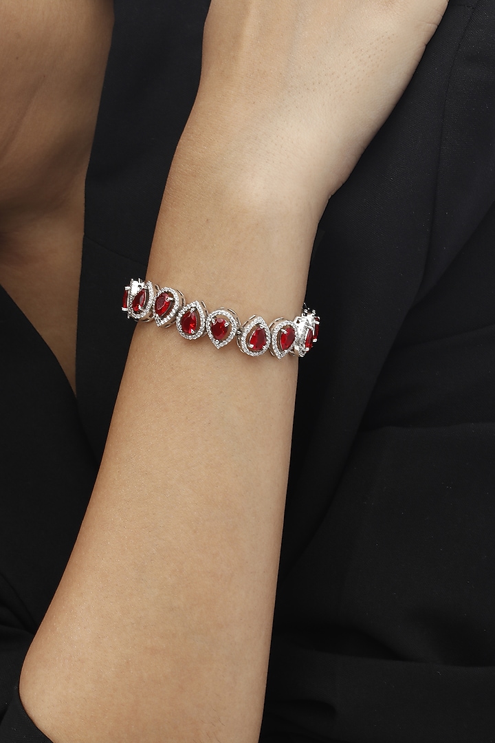 White Finish Swarovski & Ruby Bracelet In Sterling Silver by Tesoro by Bhavika at Pernia's Pop Up Shop