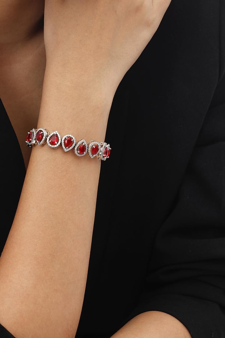 White Finish Swarovski & Ruby Bracelet In Sterling Silver by Tesoro by Bhavika at Pernia's Pop Up Shop