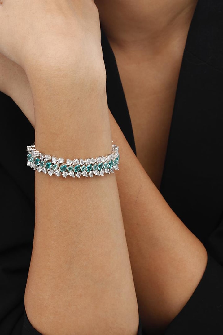 White Finish Swarovski & Aquamarine Stone Bracelet In Sterling Silver by Tesoro by Bhavika at Pernia's Pop Up Shop