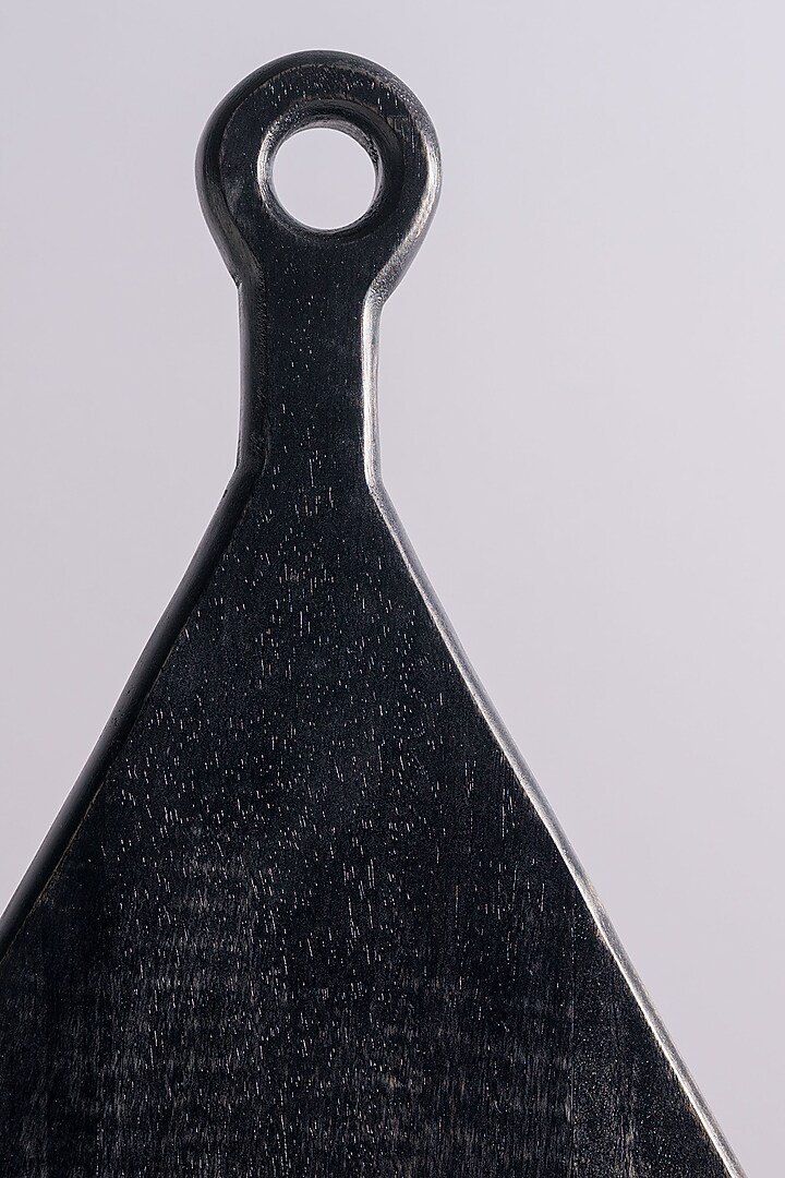 Black Triangular Chopping Board by Araana Home at Pernia's Pop Up Shop