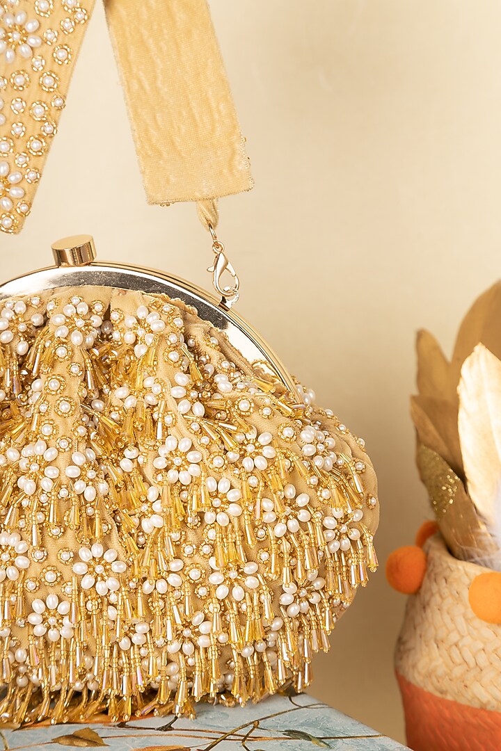Gold Raw Silk Embellished Soft Pouch by Ara Studio at Pernia's Pop Up Shop