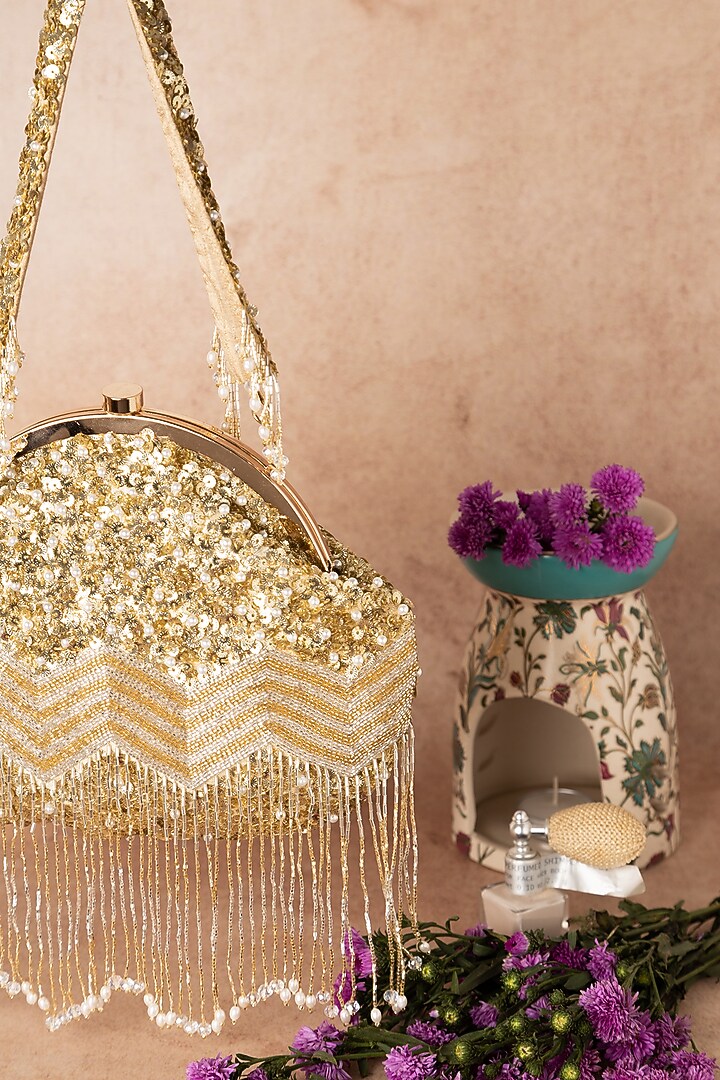 Gold Raw Silk Embellished Soft Pouch by Ara Studio at Pernia's Pop Up Shop