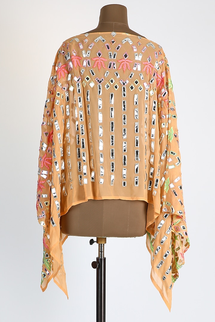 Peach Embellished Asymmetric Top by Arab Crab at Pernia's Pop Up Shop