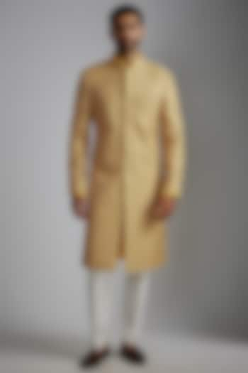 Mustard Chanderi Silk Embroidered Groom Sherwani Set by ARJAN DUGAL at Pernia's Pop Up Shop