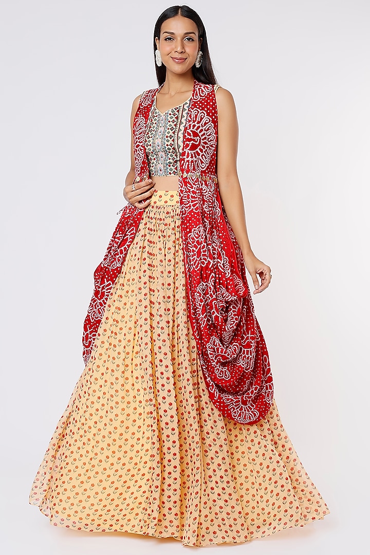 Beige Printed Skirt Set With Cadmium Red Cowl Cape by Label Anushree