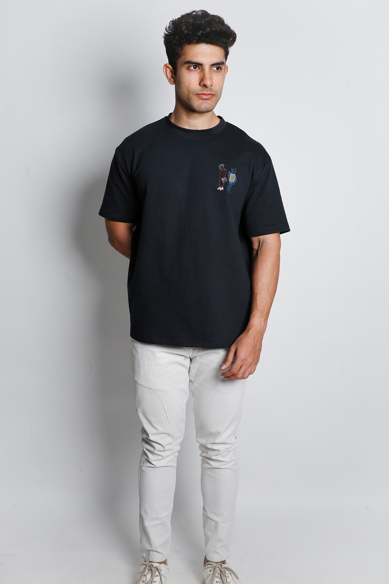 Black Knit Oversized Hand Embroidered T-Shirt by Arya Giri Men