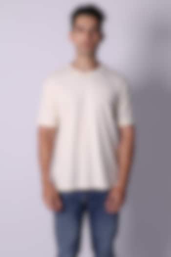 Ivory Knit Fabric Hand Embroidered T-Shirt by Arya Giri Men at Pernia's Pop Up Shop