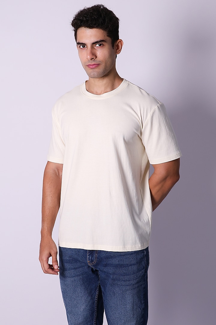 Ivory Knit Fabric Hand Embroidered T-Shirt by Arya Giri Men at Pernia's Pop Up Shop