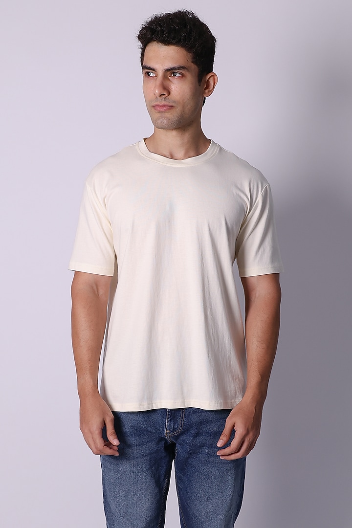Ivory Knit Fabric Hand Embroidered T-Shirt by Arya Giri Men at Pernia's Pop Up Shop
