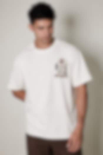 White Knit Fabric Hand Embroidered T-Shirt by Arya Giri Men at Pernia's Pop Up Shop