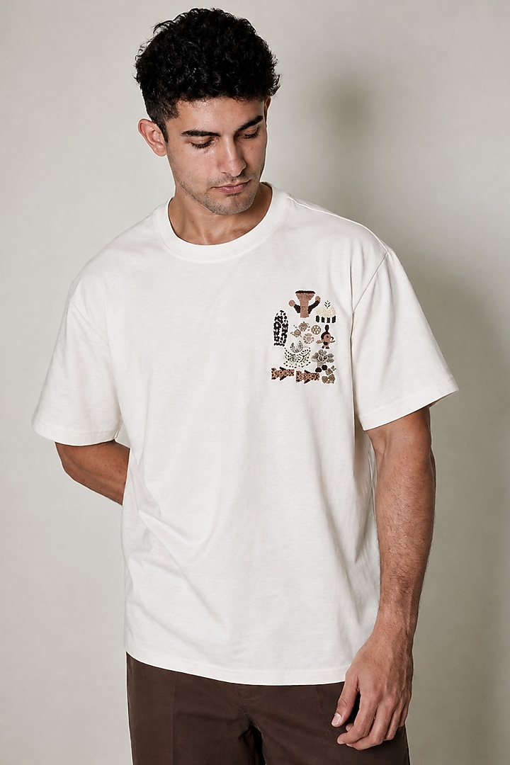 White Knit Fabric Hand Embroidered T-Shirt by Arya Giri Men at Pernia's Pop Up Shop