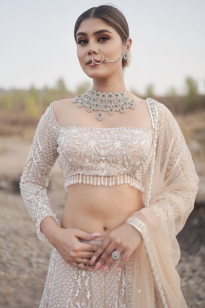 Ivory Tulle Hand Embroidered Bridal Lehenga Set by Arsh & Jas Designs at Pernia's Pop Up Shop