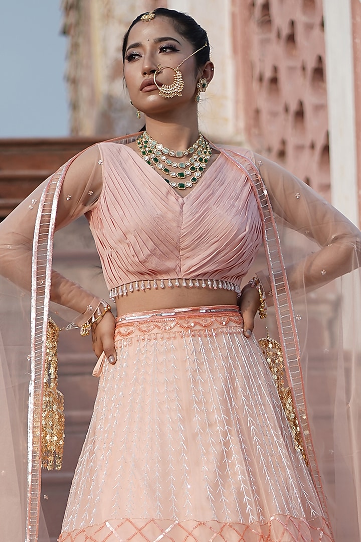 Peach Tulle Floral Hand Embroidered Bridal Lehenga Set by Arsh & Jas Designs at Pernia's Pop Up Shop