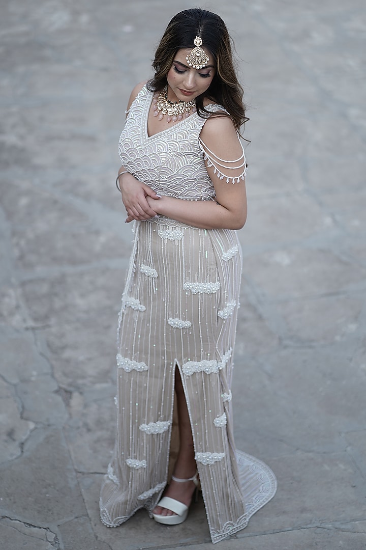 Ivory Tulle Pearl Embroidered Bridal Lehenga Set by Arsh & Jas Designs at Pernia's Pop Up Shop