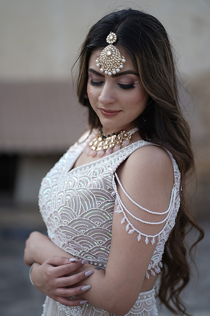 Ivory Tulle Pearl Embroidered Bridal Lehenga Set by Arsh & Jas Designs at Pernia's Pop Up Shop