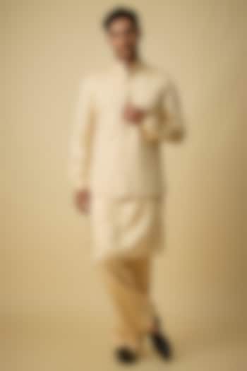 Champagne Silk Bundi Jacket Set by Arjuun Kilachand