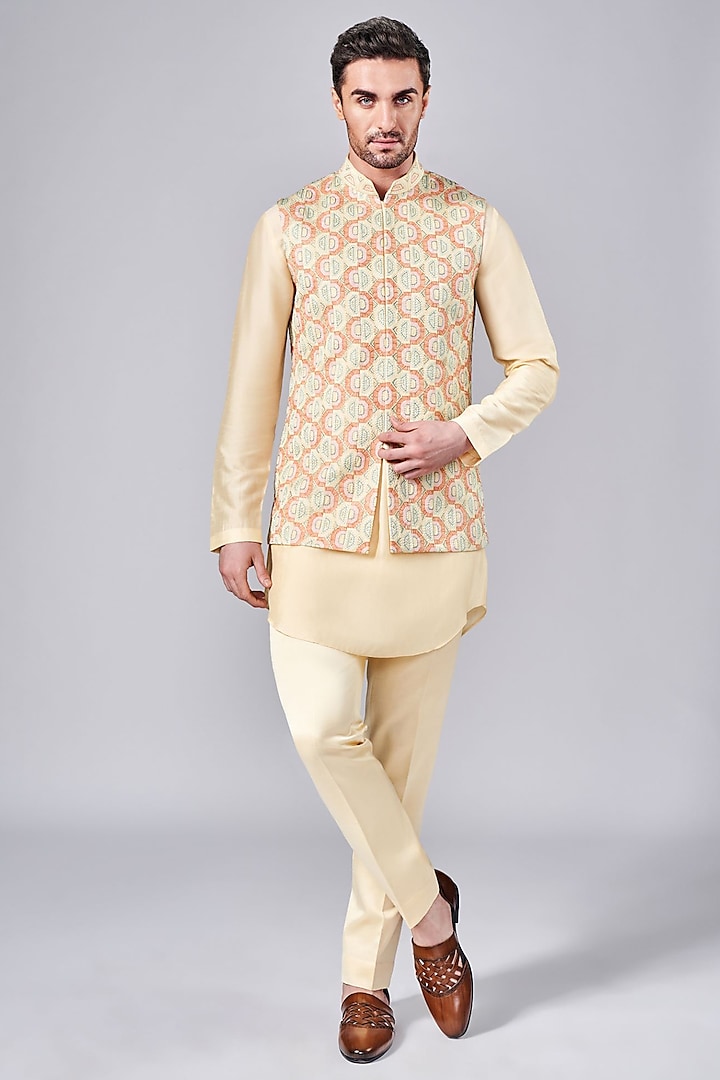 Yellow Silk Hand Embroidered Bundi Jacket Set by Arjuun Kilachand