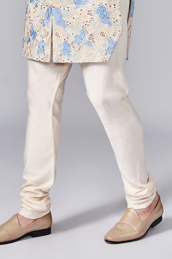 Ivory & Frozen Blue Silk Thread Embroidered Groom Sherwani Set by Arjuun Kilachand at Pernia's Pop Up Shop