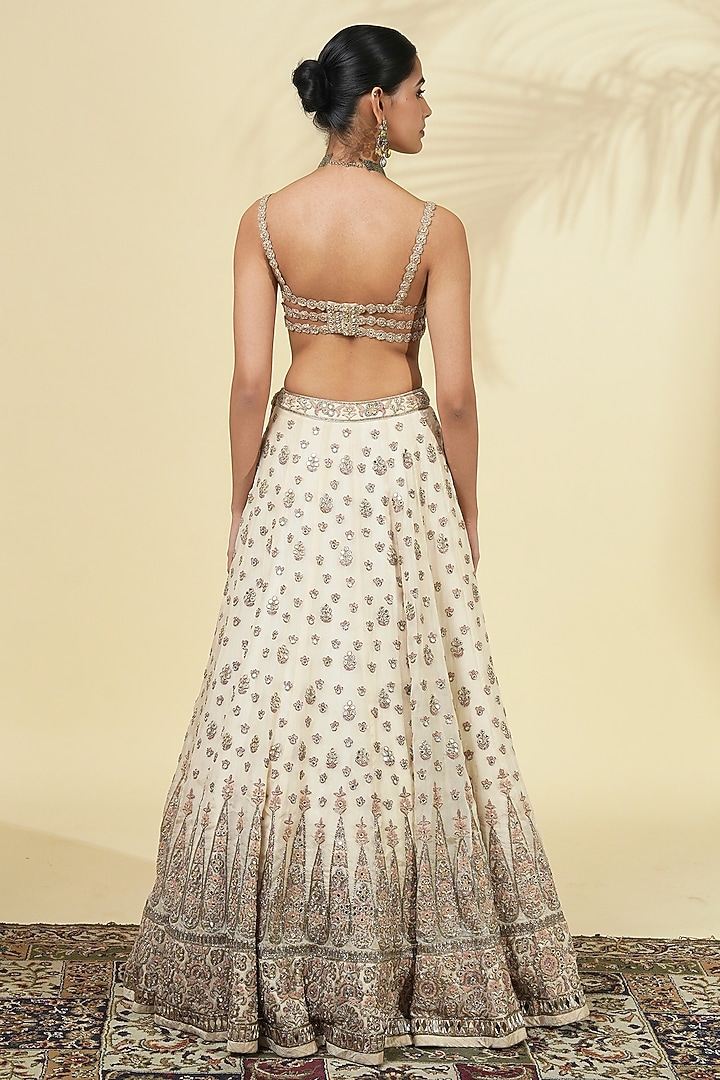 Dull Rose Gold Raw Silk Hand Embroidered Bridal Lehenga Set by Arpita Mehta at Pernia's Pop Up Shop