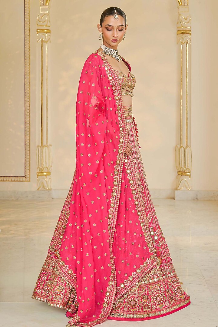 Rani Pink Organza Mirror Hand Embroidered Bridal Lehenga Set by Arpita Mehta at Pernia's Pop Up Shop
