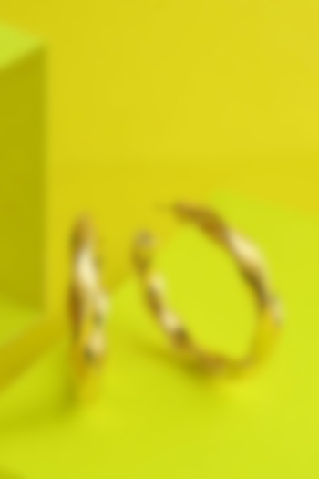 Gold Finish Swivel Hoop Earrings In Sterling Silver by ARVINO