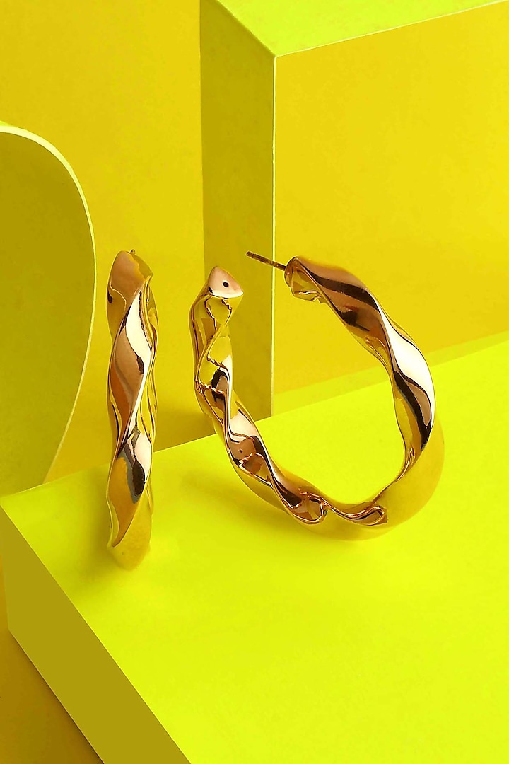 Rose Gold Finish Swivel Hoop Earrings In Sterling Silver by ARVINO