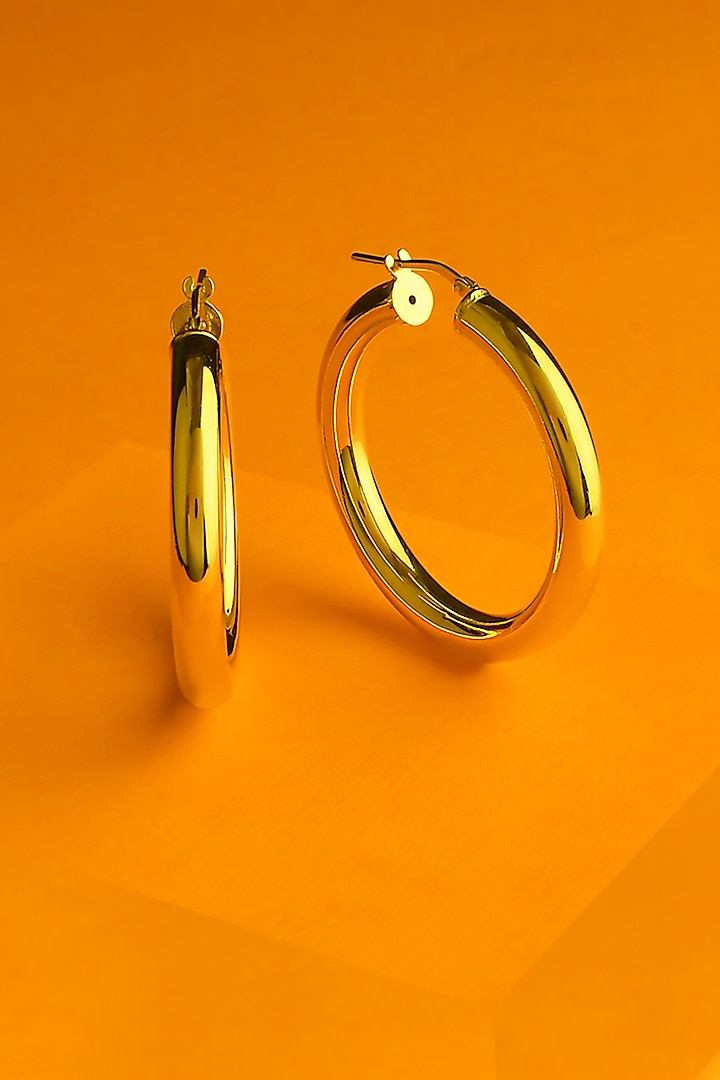 Gold Finish Gacimy Hoop Earrings In Sterling Silver by ARVINO