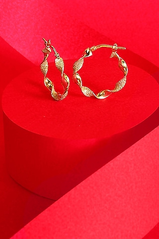 Gold Finish Twisted Hoop Earrings In Sterling Silver by ARVINO