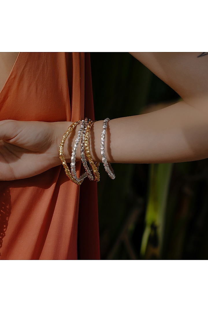 Silver Finish Textured Rowdy Bangle In Sterling Silver by ARVINO at Pernia's Pop Up Shop