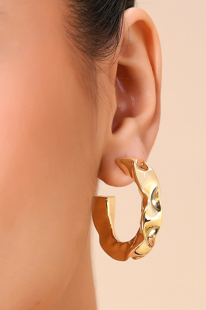 Gold Finish Hammered Foil Hoop Earrings by Arvino at Pernia's Pop Up Shop