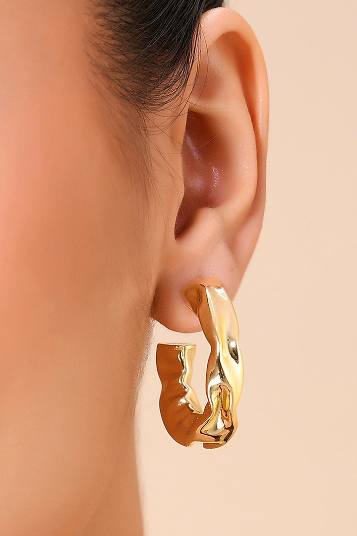 Gold Finish Hammered Foil Hoop Earrings by Arvino at Pernia's Pop Up Shop