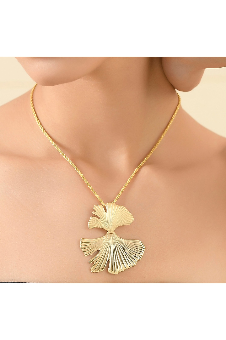 Gold Finish Ginkgo Duo Leave Necklace by ARVINO at Pernia's Pop Up Shop