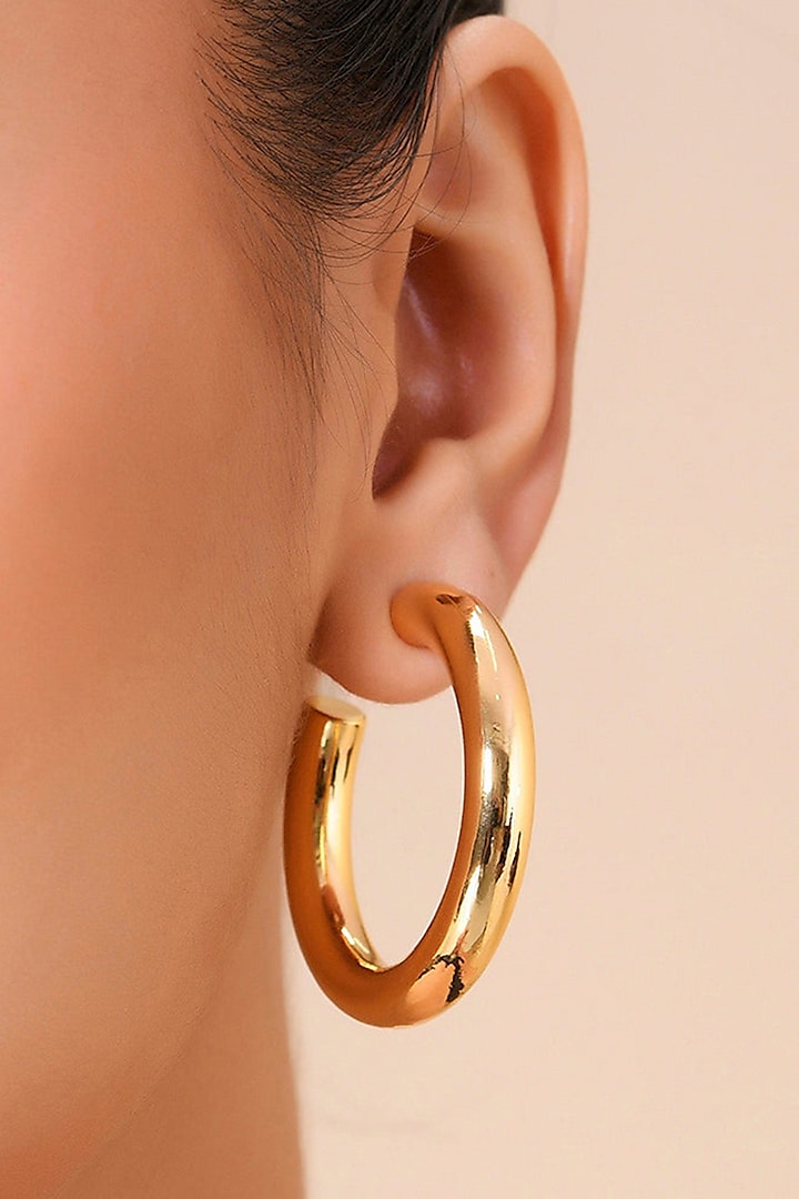 Gold Finish Large Hoop Earrings by ARVINO at Pernia's Pop Up Shop