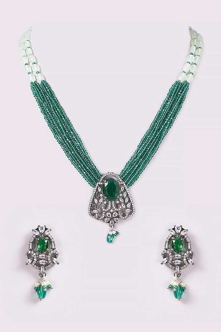 Gold Finish Emerald Beaded Long Necklace Set by ARNIMAA