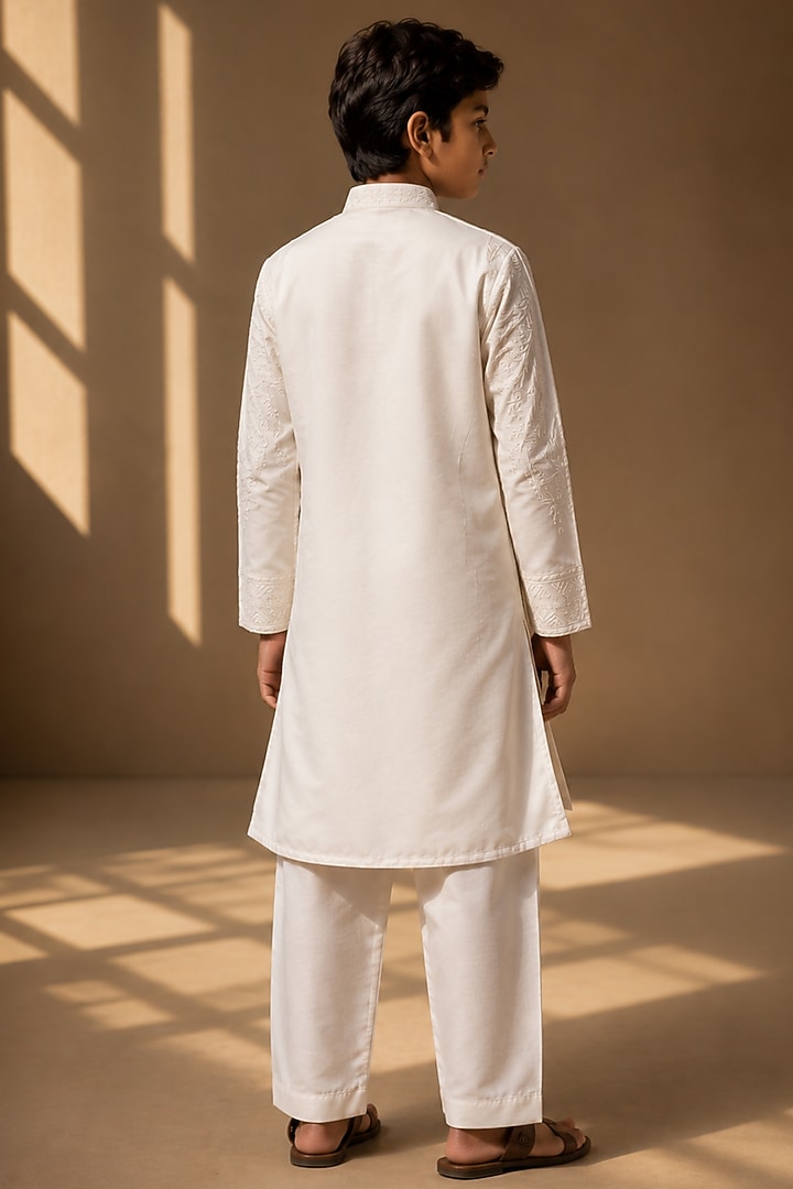 Ivory Linen Silk Dori Embroidered Kurta Set For Boys by Amit Arora Kids at Pernia's Pop Up Shop