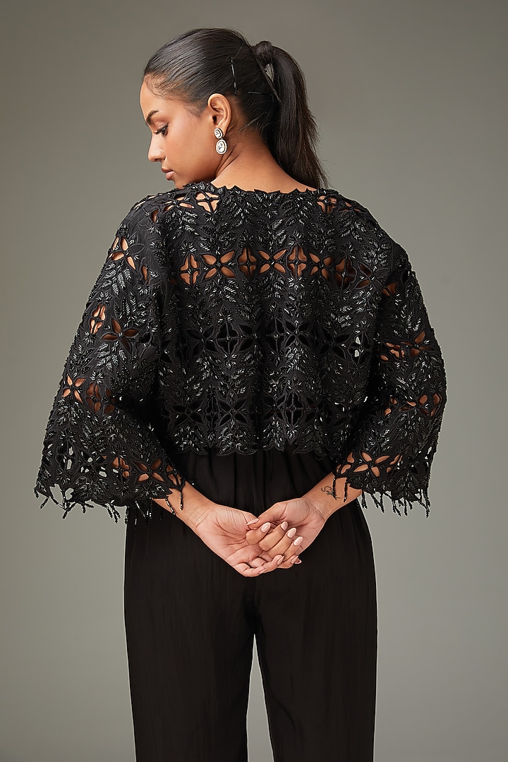 Black Crepe Cutwork Cape With Inner by LABEL ARRV at Pernia's Pop Up Shop