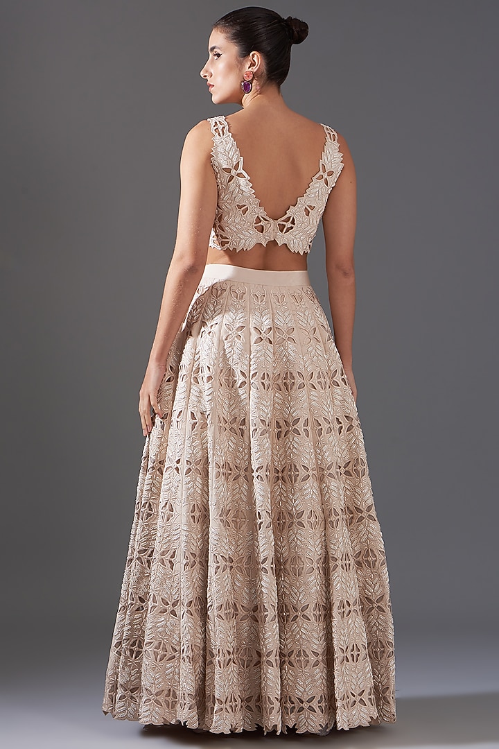 Ivory Crepe Cutwork Embroidered Bridal Lehenga Set by LABEL ARRV at Pernia's Pop Up Shop