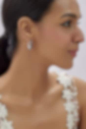 White Finish Zircon Dangler Earrings In Sterling Silver by Arista Jewels at Pernia's Pop Up Shop