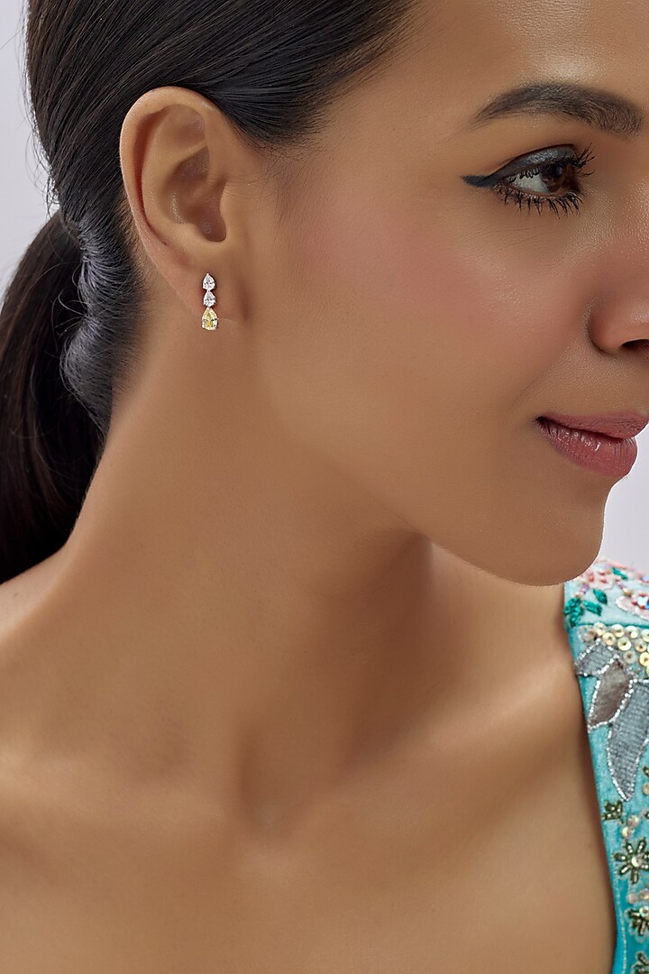 White Finish Swarovski & Yellow Sapphire Dangler Earrings In Sterling Silver by Arista Jewels at Pernia's Pop Up Shop