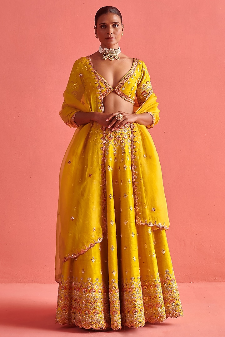 Yellow Raw Silk Hand Embroidered Lehenga Set by aarti Sethia