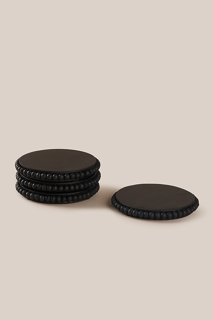 Black Mango Wood Monochrome Coaster Set by ARTISAN LAB at Pernia's Pop Up Shop