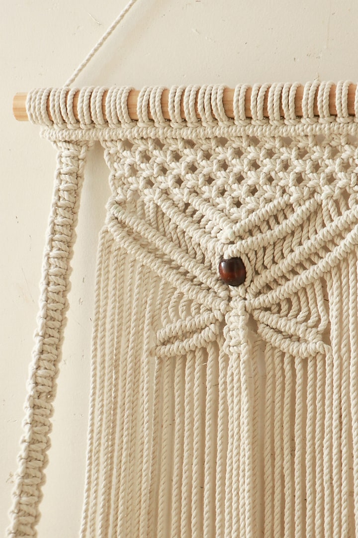 Off-White Pinewood & Natural Cotton Thread Butterfly Shelf Wall Hanging by Karighar - House of Indian Craftsmanship at Pernia's Pop Up Shop
