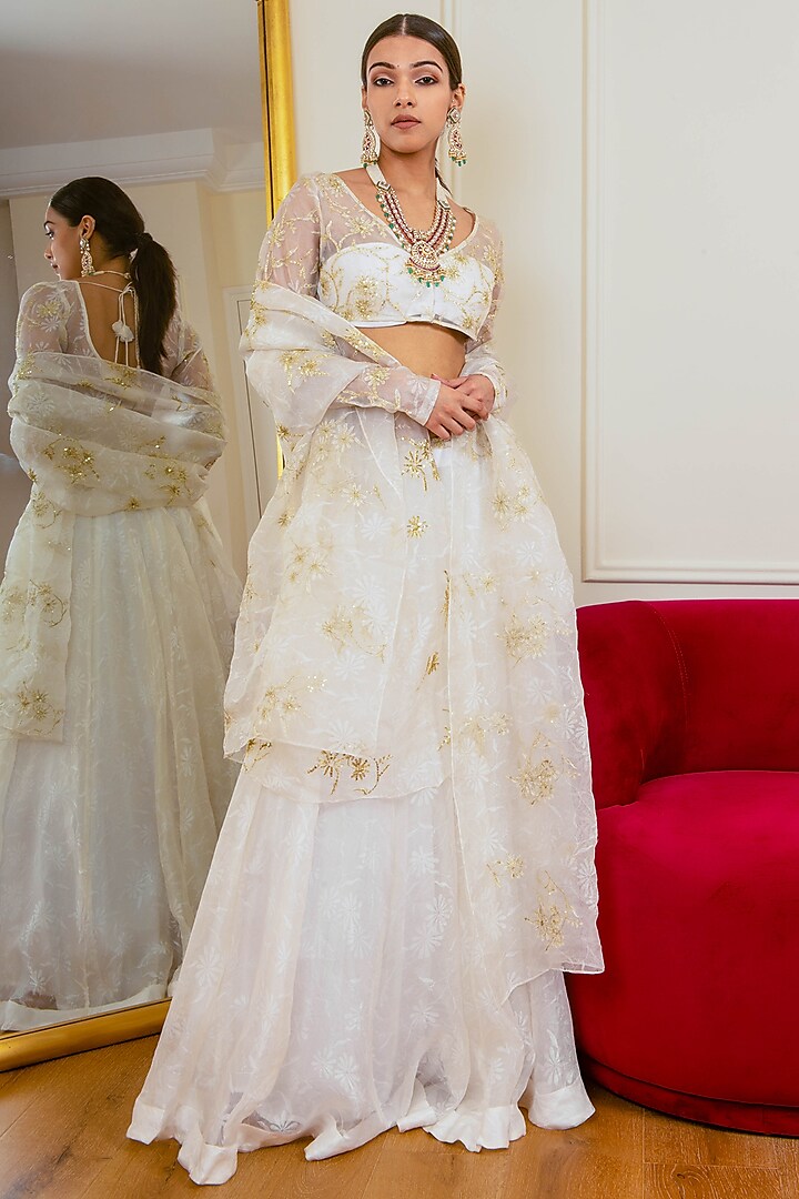 Ivory Silk Organza Embroidered Wedding Lehenga Set by AURUHFY at Pernia's Pop Up Shop