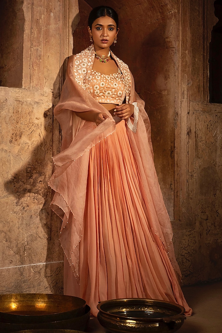 Salmon Pink Georgette Hand Embroidered Lehenga Set by Auruhfy